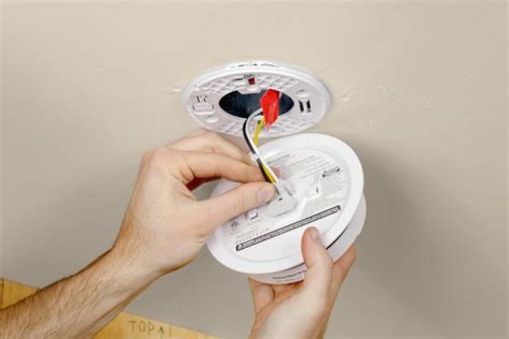 When should I replace my hardwired smoke detectors